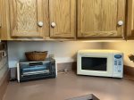 Kitchen counter with microwave and toaster oven